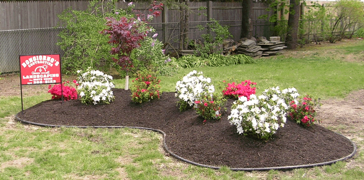 RAISED KIDNEY SHAPED ISLAND AND PLANTING DESIGN IN LONG ISLAND, NY